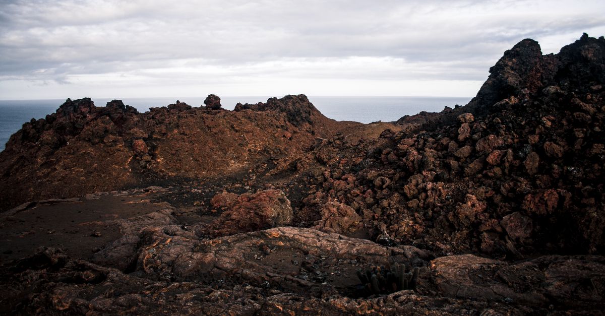 Volcanic Galapagos landscape above the ocean.